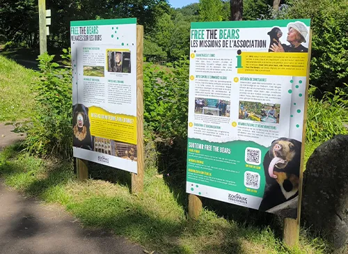 Educational panels from the Free the Bears association along a path