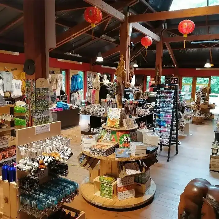 Interior of the ZooParc shop with soft toys, cards, red lanterns and display stands